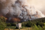 Fire above Miren, Slovenia, seen from across the border in Rupa, Italy, July 20, 2022.