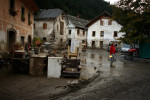Citizens of Železniki clean up their houses after a devestating flash flood the day before.