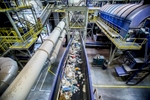 At RCERO Ljubljana mechanical biological treatment plant, shredded and sieved waste travels on conveyor belts through seperators that separate 95% of residual waste into recyclable materials.