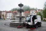 A street sweeper cleans the city streets using rainwater collected from the rooftops of Voka Snaga's company facilities and biodegradable detergent.