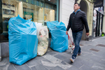 Small business that produce large ammounts of waste in the city center must buy bags for waste separation and leave them on their doorstep in the morning for door to door collection.