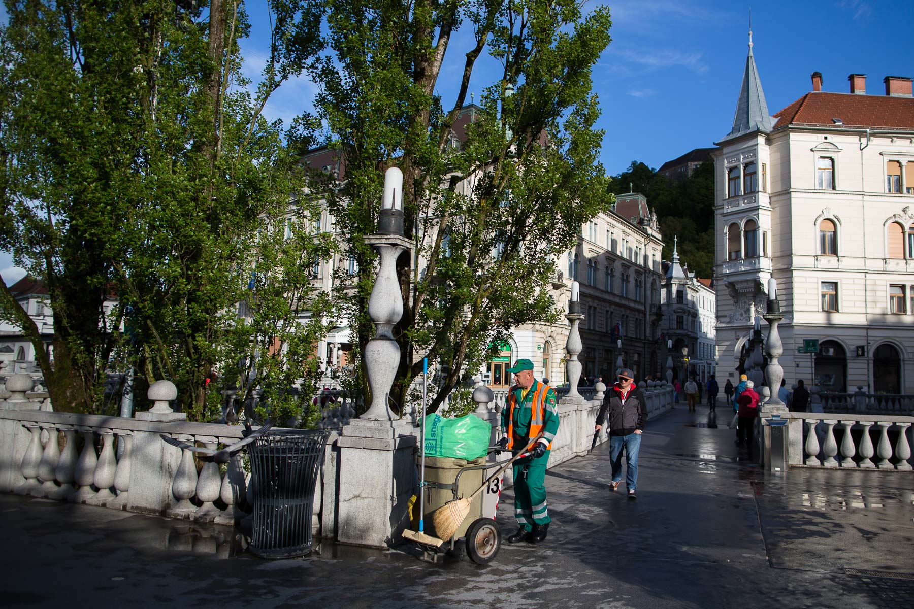 Voka Snaga workers regularly clean the streets of the historical city center of Ljubljana.
