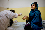 Bibi Adela, age15, from Khost gets her wound treated on her amputated leg at the International Red Cross Orthopedic (ICRC) rehabilitation center November 23, 2009 Kabul, Afghanistan. Bibi Adela lost her leg below the knee from a rocket attack 5 months ago that killed her sister and brother, injuring her mother as well. A recent U.N. report has described 2009 as the deadliest year in terms of civilian casualties in Afghanistan  since the start of the U.S.-led war against Taliban in the country.  