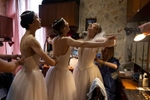 LVIV, UKRAINE - Ballet dancers enjoy some laughter getting ready for their upcoming performance of Giselle June 10, 2022 in Lviv, Ukraine. The Lviv National Opera house started performances last month for both ballet and opera.The bomb shelter can only hold 300 people so tickets are limited incase a siren goes off during the performance. (Photo by Paula Bronstein /Getty Images)