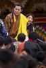 THIMPHU, BHUTAN - OCTOBER 15: The Royal couple, King Jigme Khesar Namgyel Wangchuck, Queen of Bhutan Ashi Jetsun Pema Wangchuck greet thousands of Bhutanese citizens at the celebration ground at ChangLeme Thang October 15, 2011 in Thimphu, Bhutan. In this final day of wedding celebrations for the royal couple more than 50,000 people turned up at the stadium to see dancing and singing.  (Photo by Paula Bronstein /Getty Images)