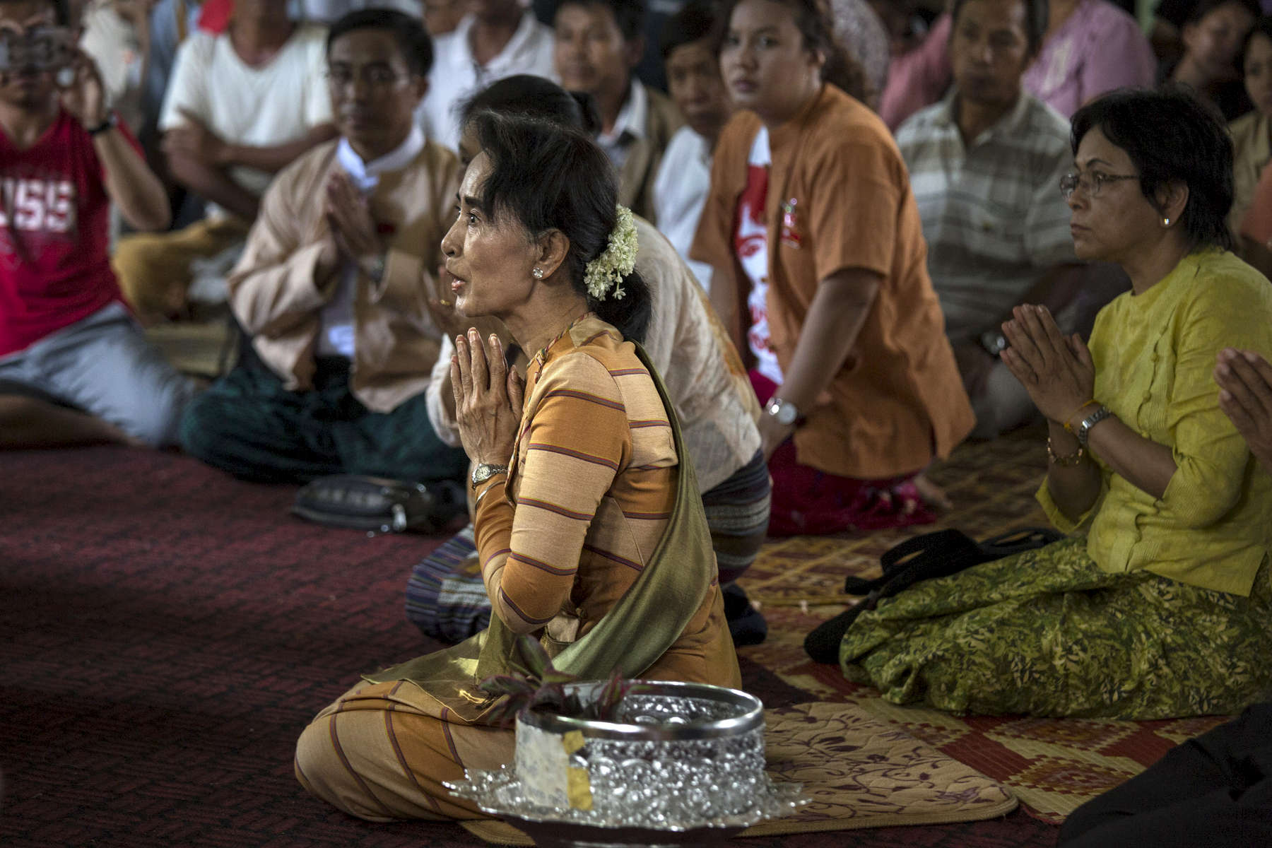 Hsih Seng: Aung San Suu Kyi prays at a local monastery as she visits with monks during an early election campaign visit to Shan state.Paula Bronsteinfor Der Spiegel / Getty Images Reportage