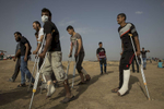 GAZA CITY, GAZA STRIP- MAY 25,2018: Injured protesters are seen at the site near the Israel-Gaza border on May 25,2018 in Gaza city, Gaza strip. At least 110 Palestinians were killed between March 30-May 15th. According to the International Committee of the Red Cross (ICRC), 13,000 Palestinians were wounded (as of June 19, 2018), the majority severely, with some 1,400 struck by three to five bullets. No Israelis were physically harmed during this time period, Israel's use of deadly force was condemned during the UN general assembly on June 13 th along with other human rights organizations. Everyone is well aware that Gaza's two million inhabitants are trapped in a cycle of violence and poverty, created by policies and political decisions on both sides. The problems and complications affecting Gaza today are overwhelming. The world, seemingly accustomed to the suffering of the Gazan people turns a blind eye. (Photo by Paula Bronstein )