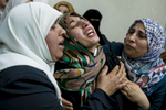 GAZA CITY, GAZA STRIP- MAY 14,2018 A family grieves as another funeral takes place on May 14,2018 in Gaza city, Gaza strip. The world’s largest open air prison along the Israel-Gaza border. Everyone is well aware that Gaza's two million inhabitants are trapped in a cycle of violence and poverty, created by policies and political decisions on both sides. The problems and complications affecting Gaza today are overwhelming. The world, seemingly accustomed to the suffering of the Gazan people turns a blind eye. (Photo by Paula Bronstein ) 