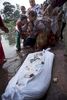 Bhaktapur, Nepal - May 8, 2015: Relatives mourn the death of Kiran Prajapati,40, who was found in the ruins of a Kathmandu building 13 days after the earthquake. He was cremated in Bhaktapur where he was from.