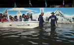 BANGKOK,THAILAND - OCTOBER 29: Thai military pull a boat full of people past a mural in a flooded neighborhood near the Chayo Praya river as rising waters threaten parts of the capitol city October 29, 2011 in Bangkok, Thailand. Hundreds of factories have been closed in the central Thai province of Ayutthaya and Nonthaburi. Thailand is experiencing the worst flooding in over 50 years which has affected more than nine million people. Over 400 people have died in flood-related incidents since late July according to the Department of Disaster Prevention and Mitigation.(Photo by Paula Bronstein /Getty Images)
