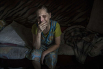 Avdiivika: Elena Parshyna,age 66, is blind and lives alone,feeling depressed and lonely after her husband had a heart attack in April. She says that she cries often now. Her son also died late in 2017 from the same fate. To make matter worse, Both were buried in a small cemetery that is mined and now too close to the military positions so she never can go visit the graves. The home was shelled last year, still damaged but Elena refuses to leave. Her remaining family - daughter and a sister all live on the other side of the contact line in Makeyevka city controlled by pro-Russian separatists. 