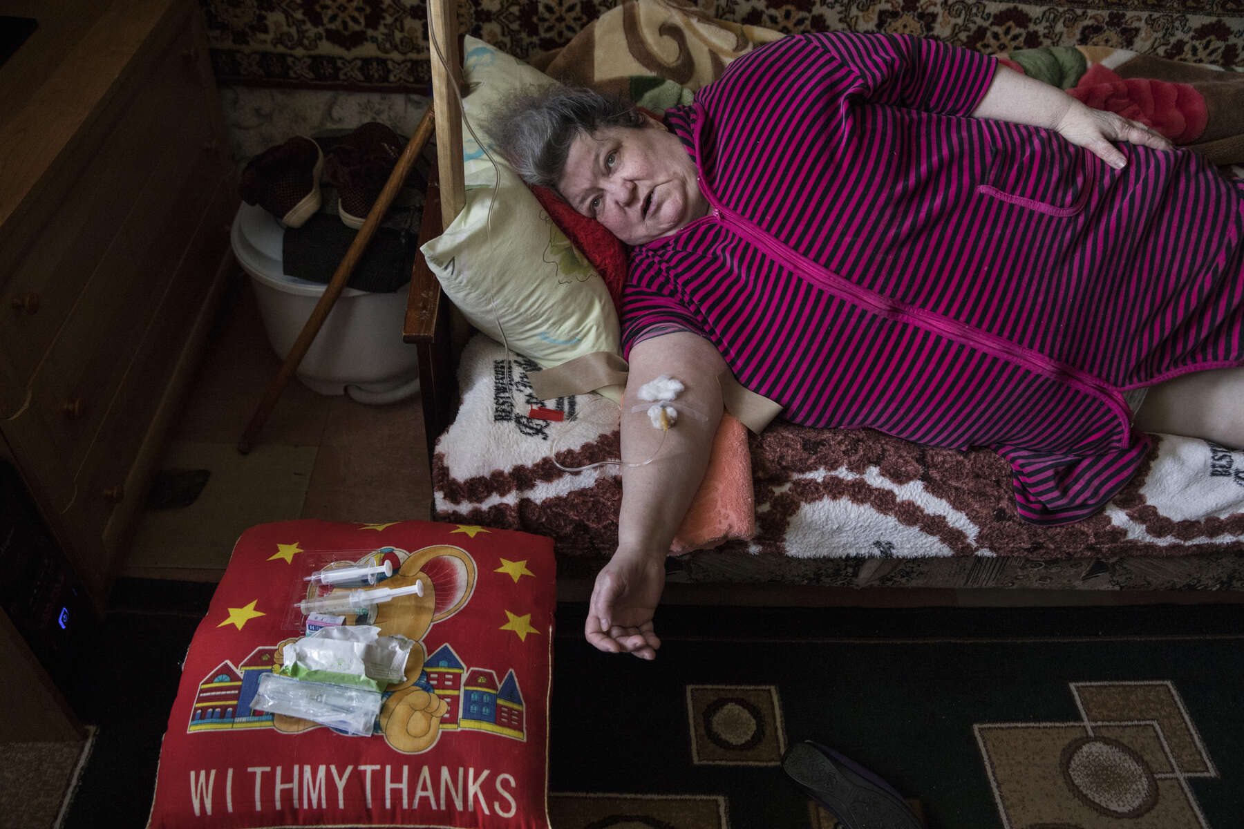 Zolote, Luhansk region: Marina Zelenina, 64, lives alone. She is suffering from the lung disability and is barely able to walk around her small apartment. Her neighbor does shopping for her. A local nurse, Elena visits a few times per week to provide her with medical assistance scarce in this area situated few kilometers away from fighting. Her elderly mother died from a heart attack after she had undergone severe shock caused by the shelling at the height of the conflict. Marina's family left the city looking for employment and safety. The woman has not seen them since. Now she talks with them over Skype. 