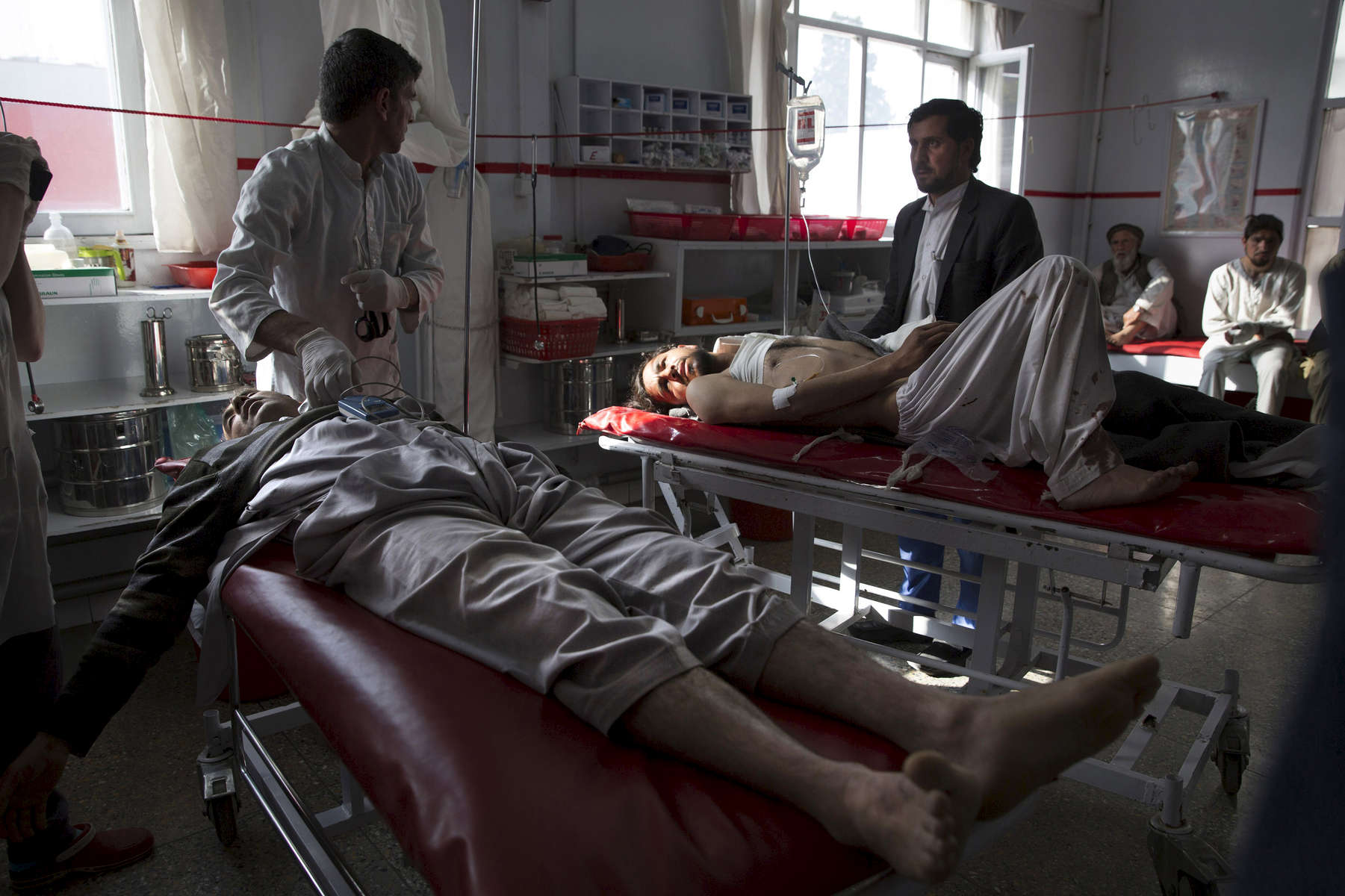 KABUL, AFGHANISTAN -APRIL 6, 2016:   A the Emergency hospital multiple patients are treated in the OPD emergency area after a bomb blast in Ghorband ( near Parwan) killed 6 and injured dozens in Kabul on April 6, 2016. Afghan civilians are at greater risk today than at any time since Taliban rule. According to UN statistics, in the first half of 2016 at least 1,600 people had died, and more than 3,500 people were injured, a 4 per cent increase in overall civilian causalities compared to the same period last year. The upsurge in violence has had devastating consequences for civilians, with suicide bombings and targeted attacks by the Taliban and other insurgents causing 70 percent of all civilian casualties.  