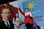The candidate of IYI Parti Meral Akşener, former minister of the Interior, salutes her supporters in Ankara as she arrives on the stage for a rally on May 30, 2018