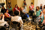 Pageant contestants chat with members of the Walk and Roll Dance Team, who came to give a workshop on wheelchair dancing.
