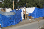 Many residents of the Santa Ana River Bed homeless encampment built structures that include doors and walls for privacy. By the end of February, they had all been torn down.