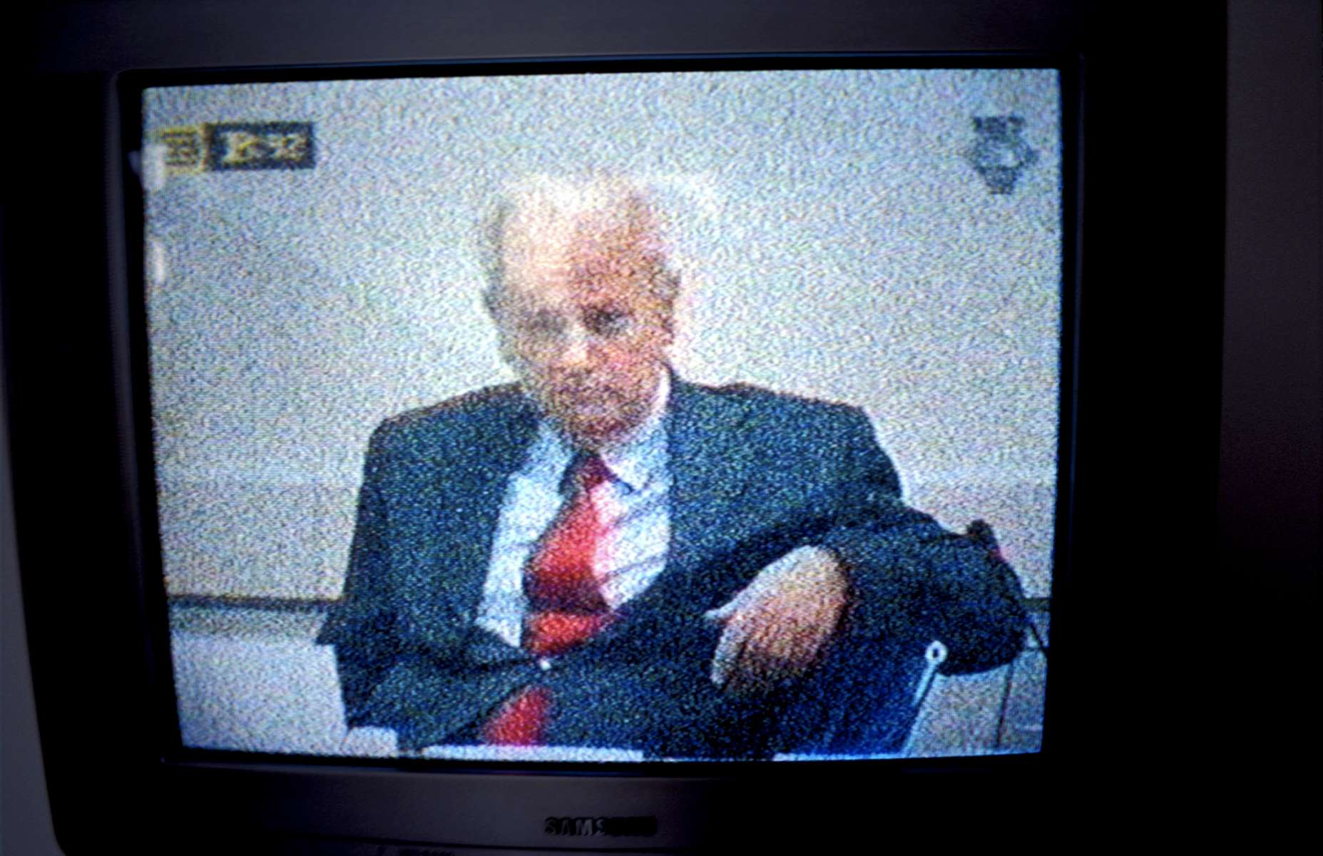 Televised proceedings of the trial of Slobodan Milosevic, the former president of Serbia, who was handed over to the International Criminal Tribunal for the Former Yugoslavia and sent to the Hague in 2000. Milosevic was indicted in November 2001 for genocide in Bosnia during the war; by early 2005, his trial was still ongoing.
