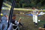 Workers take a break from an exhumation of a mass grave containing victims of the 1995 Srebrenica massacre.