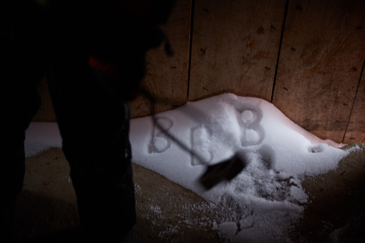 B finds an old brand in the barn.