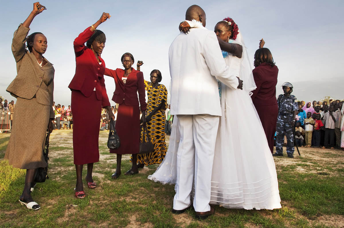 The bride and groom enjoy their first dance at their wedding reception.Mijak, Abyei Area