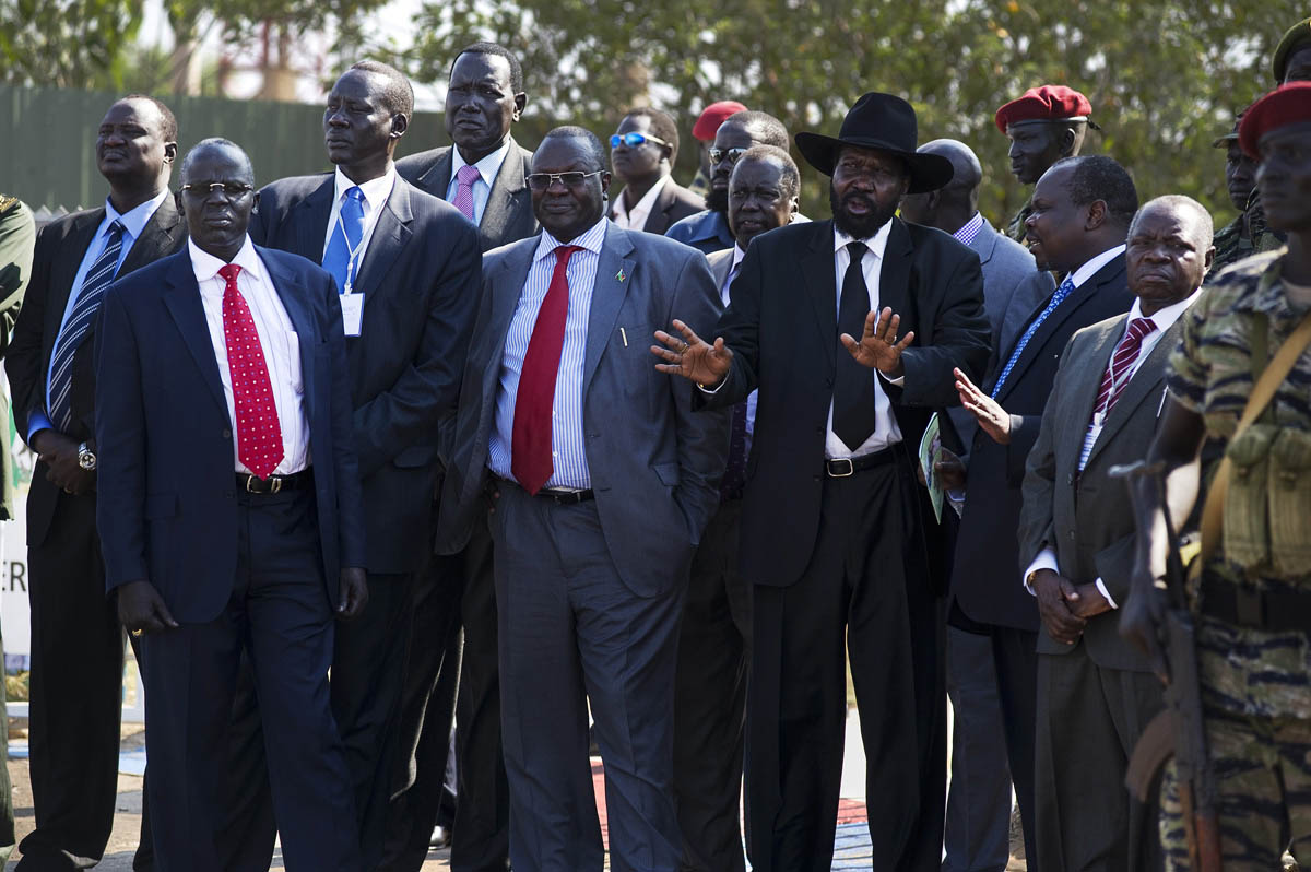 Senior members of the Government of Southern Sudan leadership including President Salva Kiir Mayardit (in hat) watch as Sudan President Omar Hassan al Bashir's plane departs Juba after a visit to the southern capital in the run-up to the referendum.Juba, southern Sudan