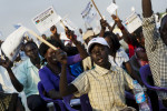 Crowds wave banners in support of secession at a rally on the eve of the referendum.Juba, southern Sudan
