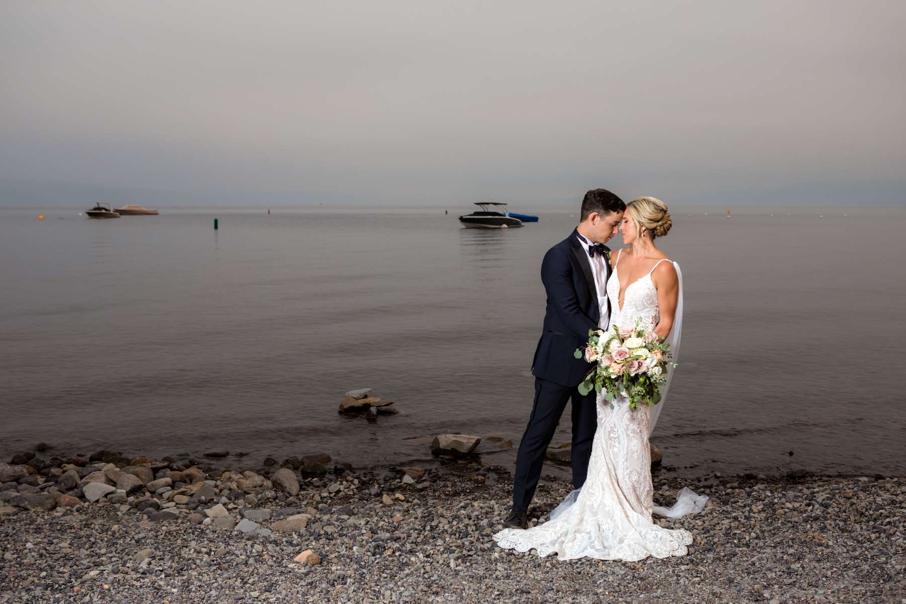 Tahoe Wedding at Gar Woods. Bride and Groom after ceremony enjoying the lake.