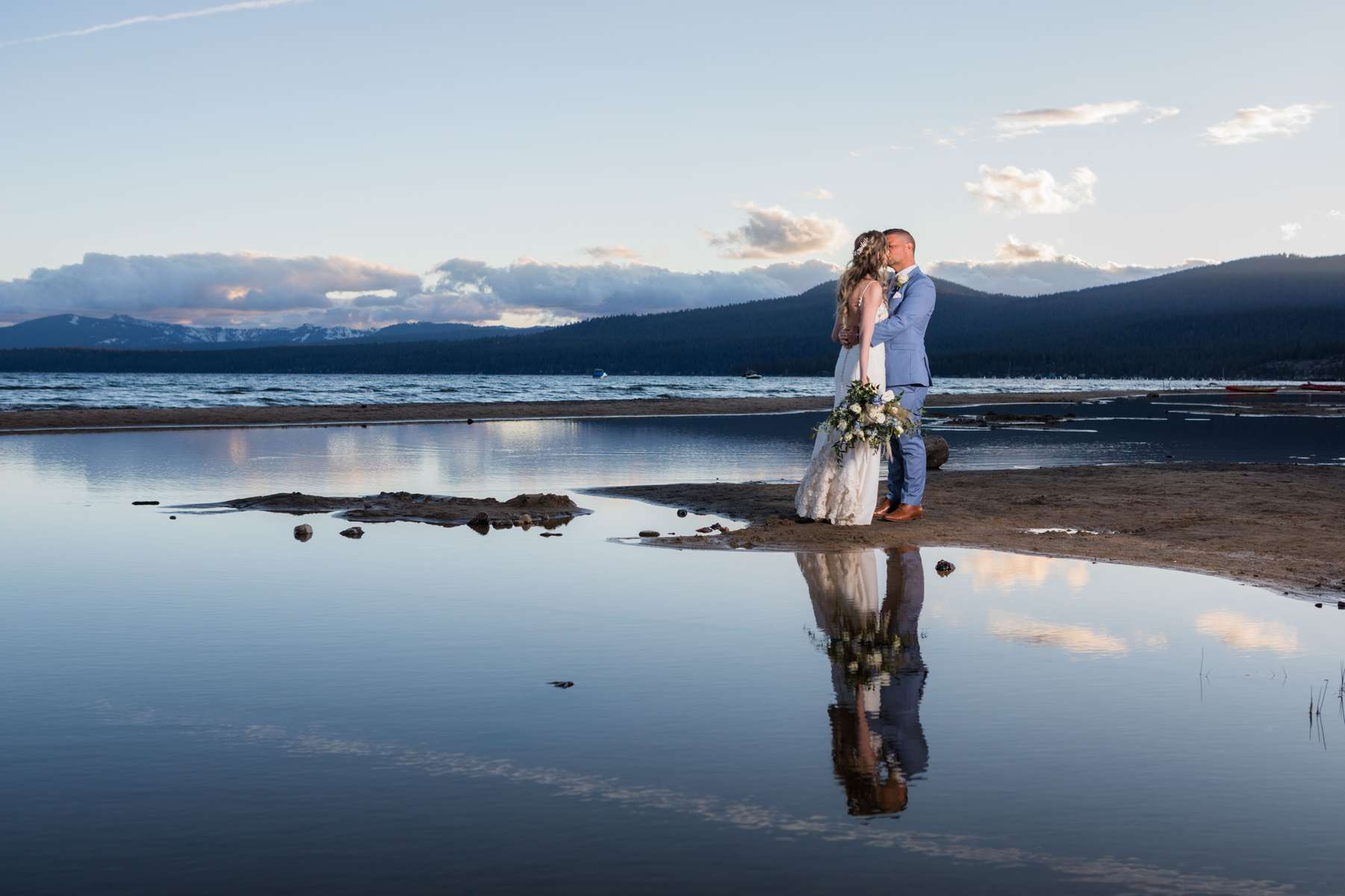 Bride and Groom taking some sunset photos at North Lake Tahoe Evet Center in Kings Beach.