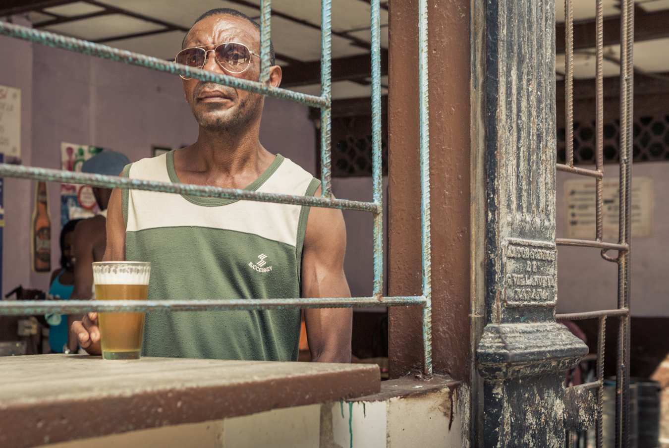moody beer drinker in Havana