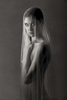 fine art black and white studio female nude with draped veil