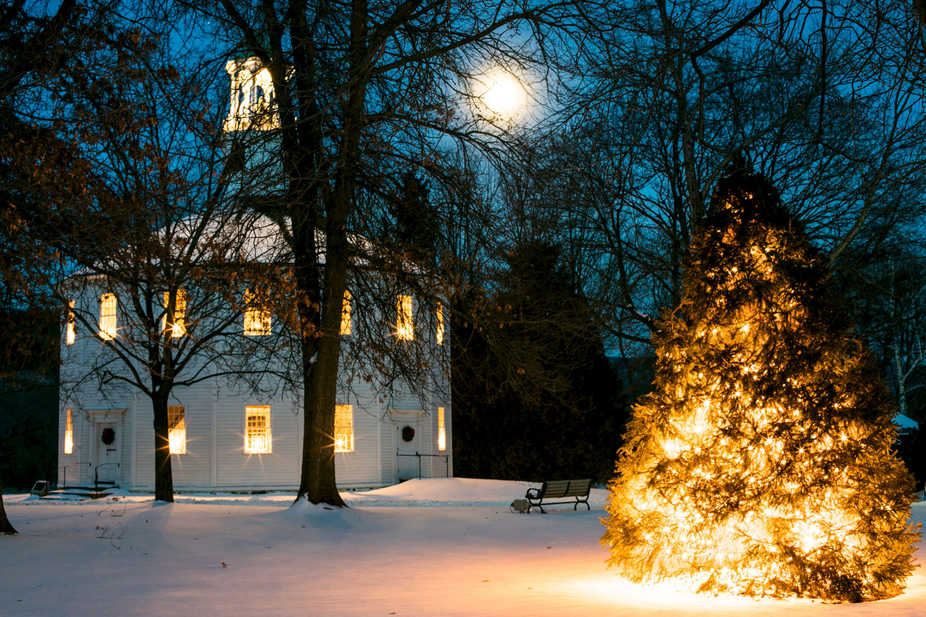 Night time long exposure photography of the Old Round Church with Christmas trees on January 22, 2016 in Richmond, Vermont. Shot by Reciprocity Studio for Efficiency Vermont
