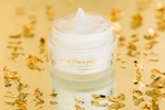 Athar'a Pure Jasmine Face Cream photographed amongst golden flakes.
