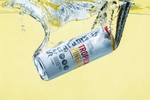 Seagram's Tropical Pineaple Hard Seltzer can splashing into water.