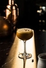 An espresso martini made with Barr Hill's Reserve Tom Cat Gin.