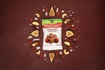 Super Food Trail Mix snack bag surrounded by its natural ingredients for Nature's Heart.