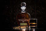 Beverage Photography of Whistlepig's 18-year whiskey with a glass stopper by Simon Pearce.