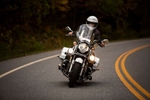 Jeffrey Schnapp rides his California Moto Guzzi motorcycle down a country road in southern Vermont.