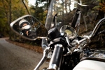 Jeffrey Schnapp rides his california Moto Guzzi motorcycle along a Vermont country road.