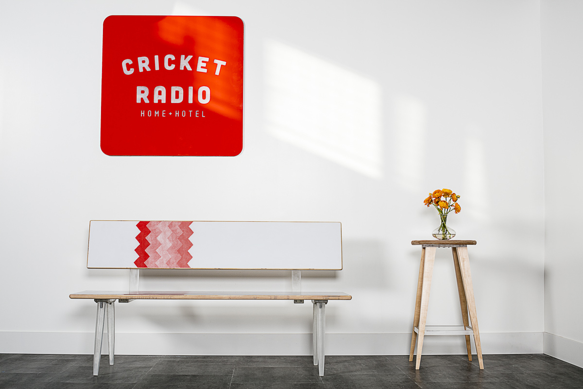 Custom furniture and wall art by Cricket Radio. Photo by Jam Creative.