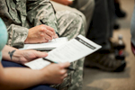 ROTC members fill out VSAC paperwork during a financial aid event - by photographers at Reciprocity Studio for the Vermont Student Assistance Corporation (VSAC)