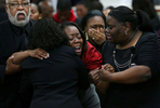 Melissa Harris breaks down and cries after viewing Quinn McCaleb's body for the last time while leaving his funeral service at Cathedral of Praise in Rialto, Calif. McCaleb was one of two Redlands High School teens killed and three others were injured in a gang-related shooting. (The Press-Enterprise/ Mark Zaleski)