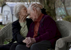 Ivy Agee, 91, gets a kiss from his wife, Virginia, 89, while sitting on their porch in Gordonsville, Tenn. Agee fought on Omaha Beach during World War II while in the U.S. Army 29th Field Division, 3rd Artillery. (The Tennessean/ Mark Zaleski)