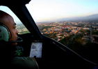 March Air Reserve Base C-17 pilot Commander Major Averie Payton watches for other aircraft while preparing to land at Port-Au-Price International Airport in Haiti. (The Press-Enterprise/ Mark Zaleski)