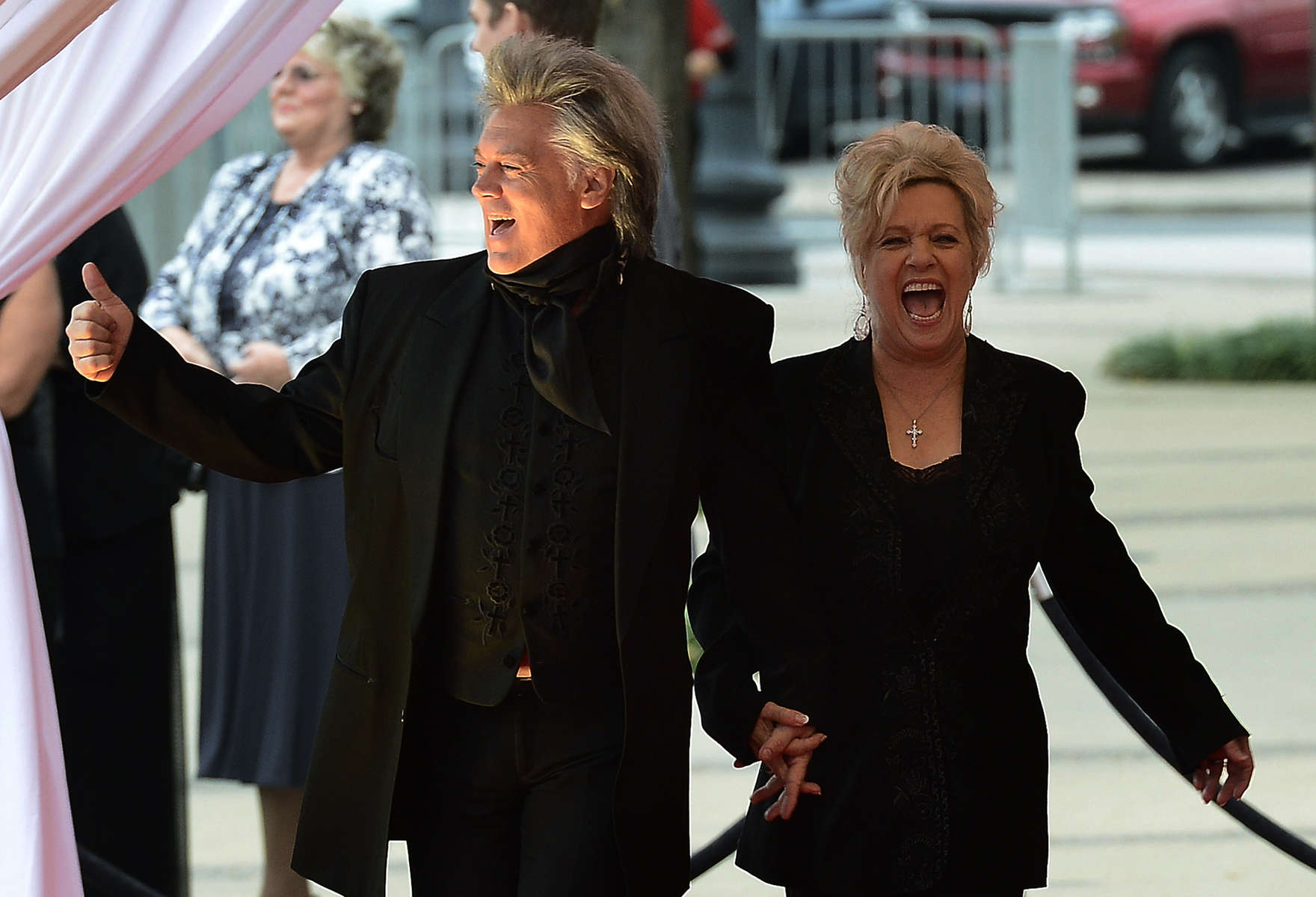 Marty Stuart and Connie Smith arrive at the ceremony for the 2013 inductions into the Country Music Hall of Fame in Nashville, Tenn. The inductees are Bobby Bare, the late “Cowboy” Jack Clement and Kenny Rogers. (AP Photo/ Mark Zaleski)