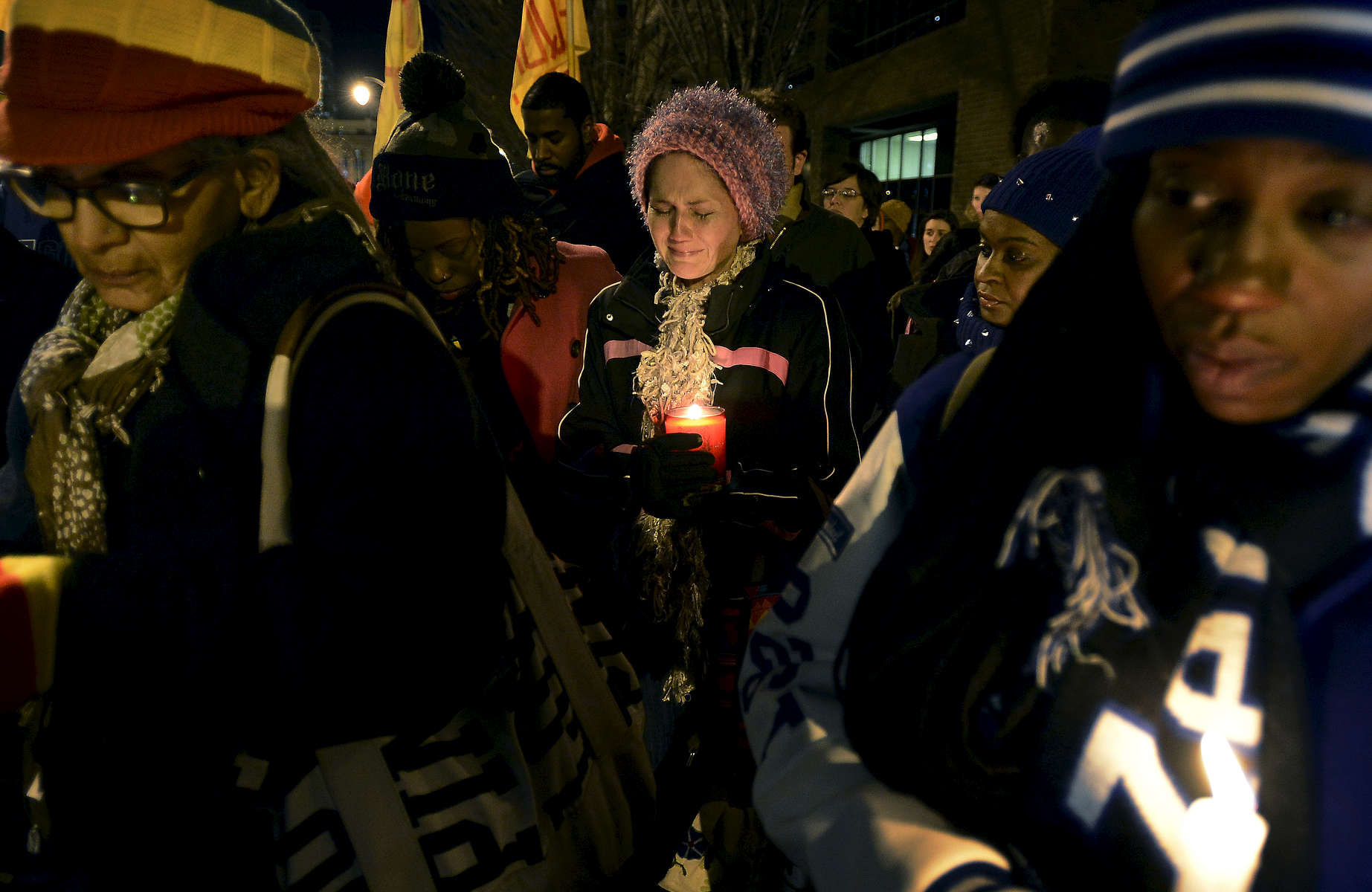 A woman cries during a candlelight vigil in Nashville, Tenn., after a New York grand jury decided not to indict the police officers involved in the death of Eric Garner. (The Tennessean/ Mark Zaleski) 