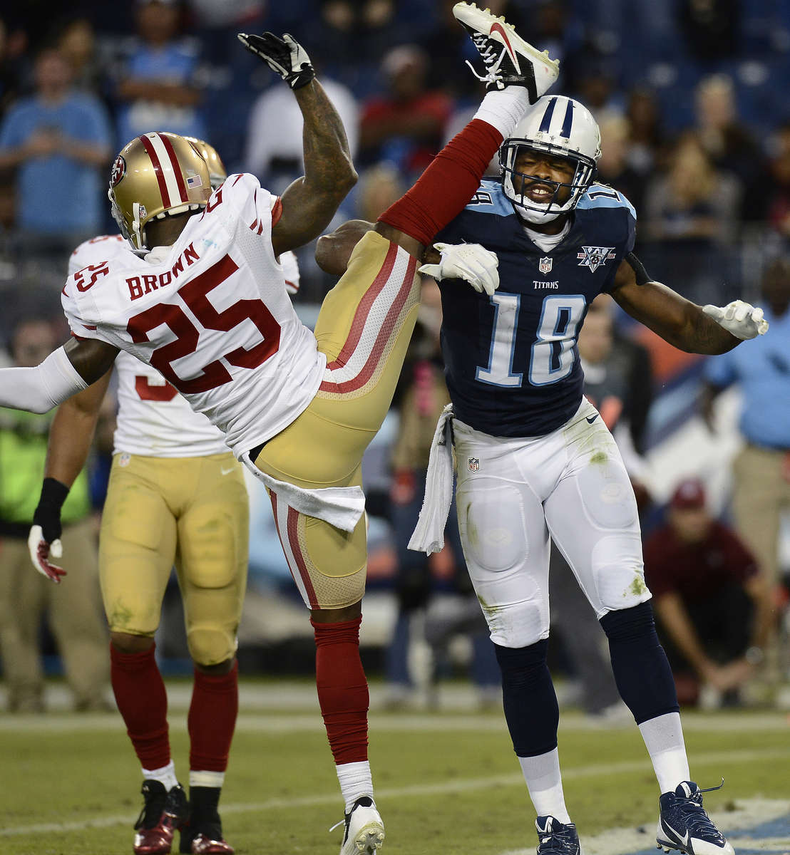 Tennessee Titans wide receiver Kenny Britt pushes San Francisco 49ers cornerback Tarell Brown after a play in the fourth quarter of a NFL football game on Oct. 20, 2013, in Nashville, Tenn. Britt was penalized for unnecessary roughness on the play. The 49ers won 31-17. (AP Photo/ Mark Zaleski)