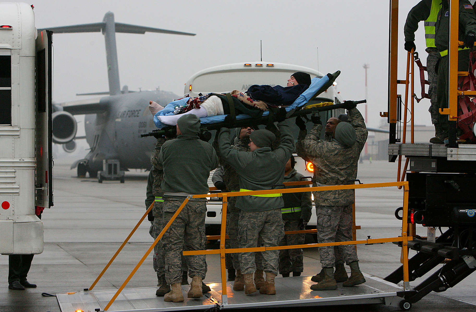 Ramstein Air Force Base air evacuation medical team unload wounded warriors from a KC-135 into a ambulance bus after the aircraft arrive from Bagram Air Force Base in Afghanistan. The wounded are transported to Landstuhl Regional Medical Center in Germany for further treatment.(The Press-Enterprise/ Mark Zaleski) 