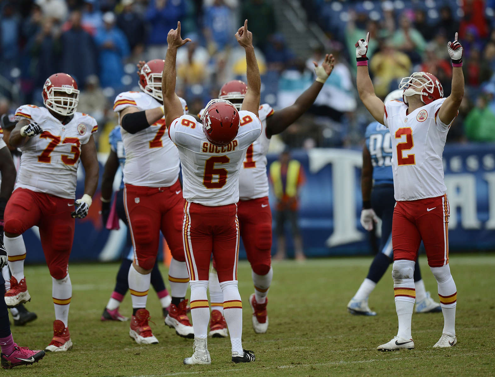 Kansas City Chiefs kicker Ryan Succop and holder Dustin Colquitt celebrate after Succop made a 48-yard field goal to seal a 26-17 win over the Tennessee Titans in thefinal minutes of the fourth quarter of an NFL football game on Oct. 6, 2013, in Nashville, Tenn. (AP Photo/ Mark Zaleski)