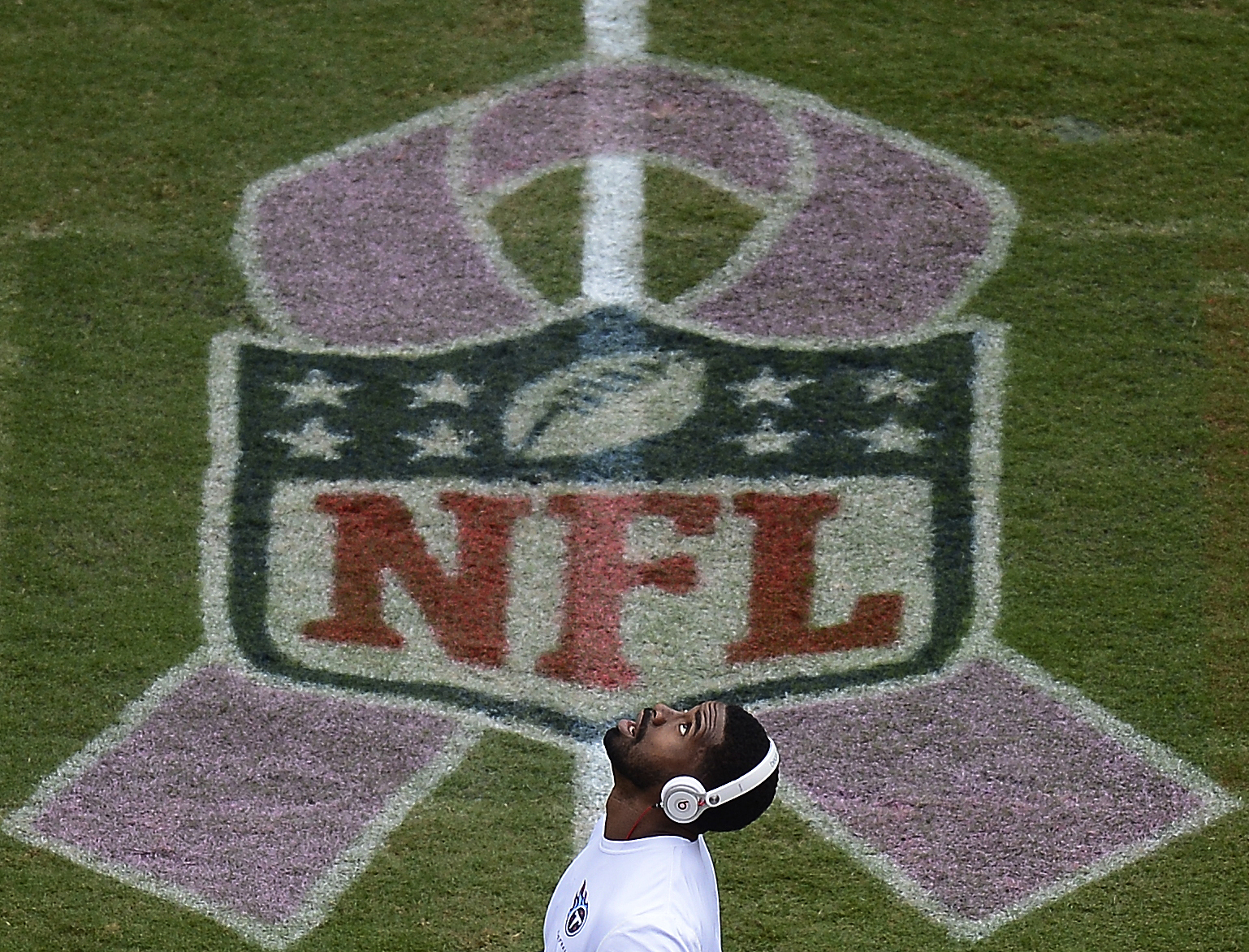 Tennessee Titans wide receiver Nate Washington warms up by a breast cancer awareness logo before an NFL football game between the Tennessee Titans and theKansas City Chiefs on Sunday, Oct. 6, 2013, in Nashville, Tenn. (AP Photo/ Mark Zaleski)