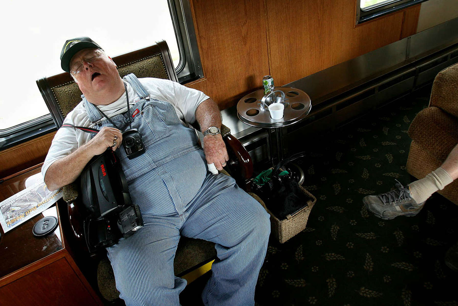 Frank Drake of Glendale falls asleep in the Tioga Pass rail car as the Kelso Flyer travels to the BarstowDepot. (The Press-Enterprise/ Mark Zaleski)